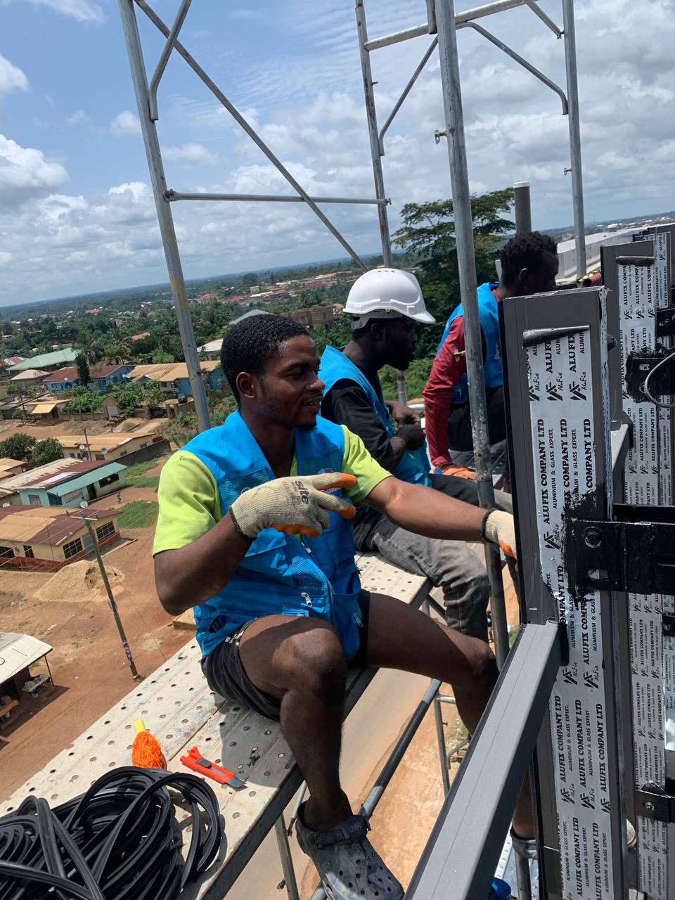 AluMaster installation team working on aluminum and glass project